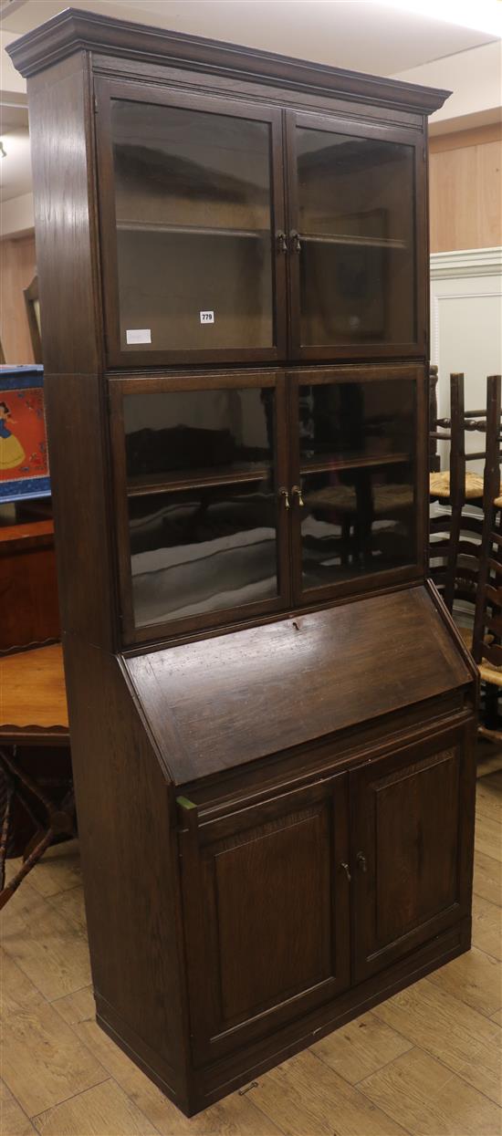 A sectional bureau bookcase, by Esavian H.212cm